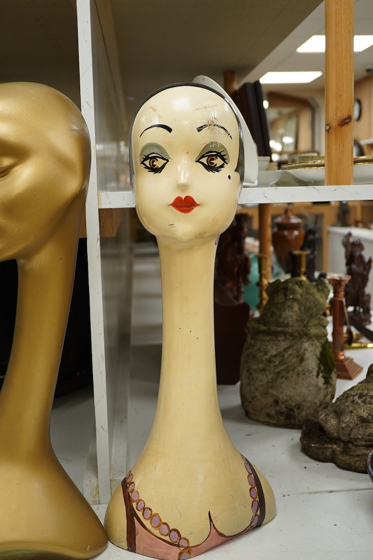 Two painted milliner’s hat display stands and two others, tallest 63cm high.